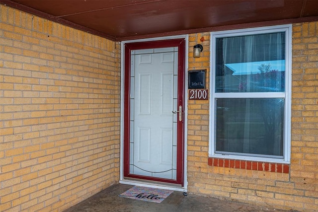 2100 Barclay Rd, Oklahoma City, OK 73120 - view of exterior entry featuring brick siding