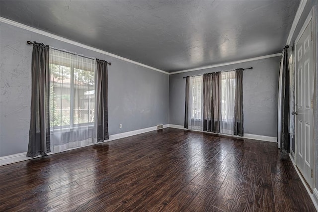 2100 Barclay Rd, Oklahoma City, OK 73120 - spare room featuring healthy amount of natural light, wood finished floors, and crown molding