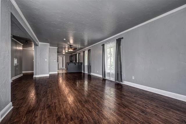 2100 Barclay Rd, Oklahoma City, OK 73120 - unfurnished living room with wood finished floors and ornamental molding