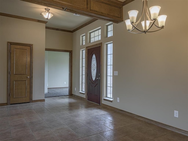 8409 NW 106th St, Oklahoma City, OK 73162 - foyer entrance featuring a chandelier, crown molding, and a towering ceiling