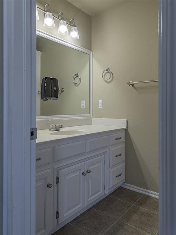 8409 NW 106th St, Oklahoma City, OK 73162 - bathroom featuring vanity and tile patterned floors