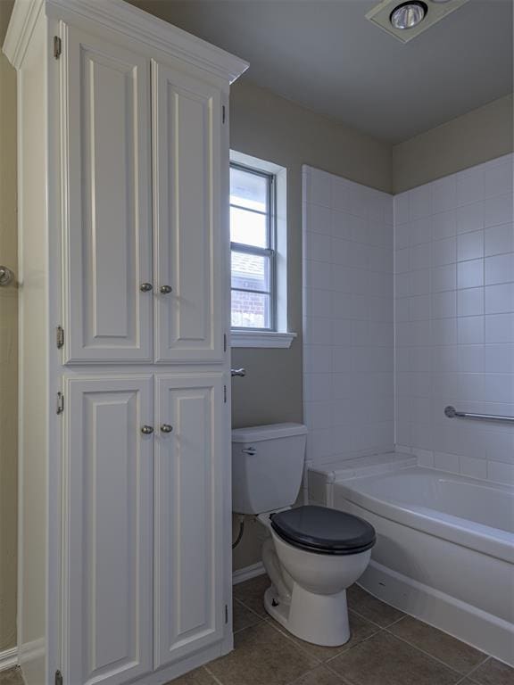 8409 NW 106th St, Oklahoma City, OK 73162 - bathroom featuring toilet and tile patterned flooring
