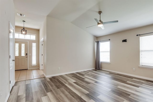 2113 SE 8th St, Moore, OK 73160 - foyer entrance with wood finished floors, ceiling fan, and lofted ceiling