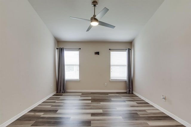 2113 SE 8th St, Moore, OK 73160 - unfurnished room with a ceiling fan and wood finished floors
