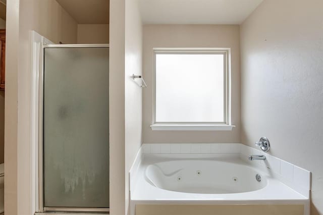 2113 SE 8th St, Moore, OK 73160 - full bath featuring a shower stall and a whirlpool tub
