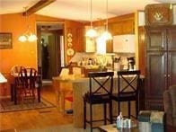 515 Logan Ave, Cashion, OK 73016 - kitchen featuring a breakfast bar and pendant lighting