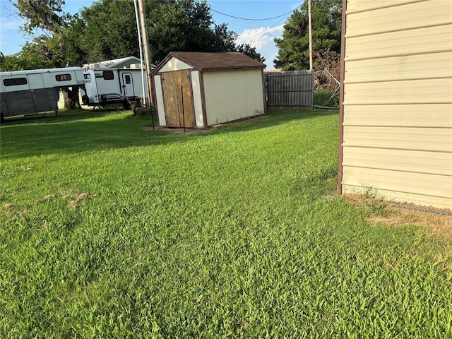 515 Logan Ave, Cashion, OK 73016 - view of yard with a storage shed