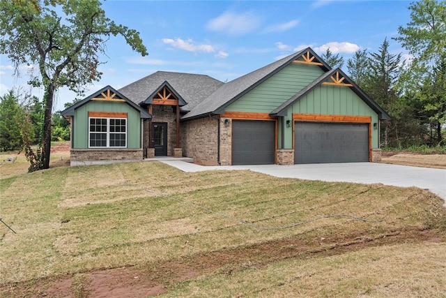 1244 Layla Ln, Blanchard, OK 73010 - craftsman-style house with an attached garage, concrete driveway, brick siding, and a front yard