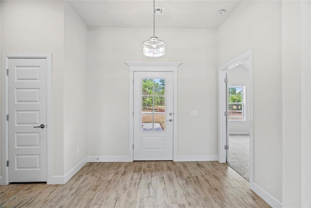 1244 Layla Ln, Blanchard, OK 73010 - entrance foyer with light wood-type flooring and baseboards