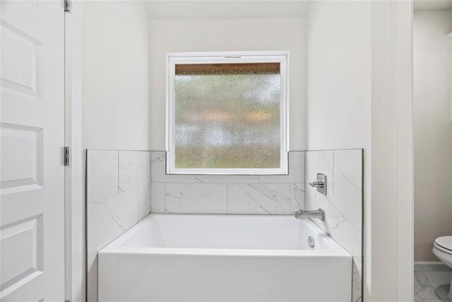 1244 Layla Ln, Blanchard, OK 73010 - full bath featuring a bath and marble look tile flooring