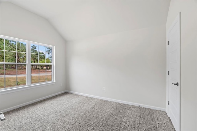 1244 Layla Ln, Blanchard, OK 73010 - spare room with carpet flooring and lofted ceiling