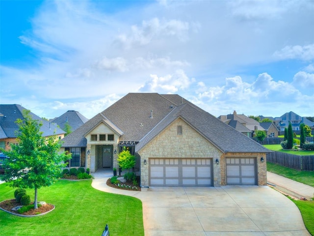 609 Newport Bridge Dr, Edmond, OK 73034 - french provincial home featuring stone siding, driveway, an attached garage, and roof with shingles