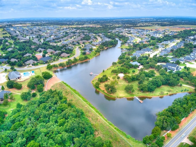 609 Newport Bridge Dr, Edmond, OK 73034 - aerial view of property and surrounding area with a large body of water and nearby suburban area