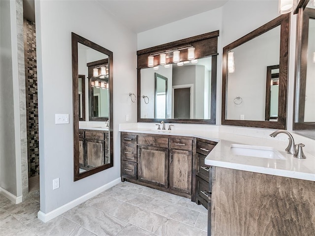 609 Newport Bridge Dr, Edmond, OK 73034 - bathroom featuring vanity and baseboards