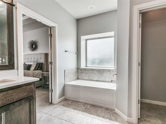 609 Newport Bridge Dr, Edmond, OK 73034 - ensuite bathroom featuring a bath and vanity