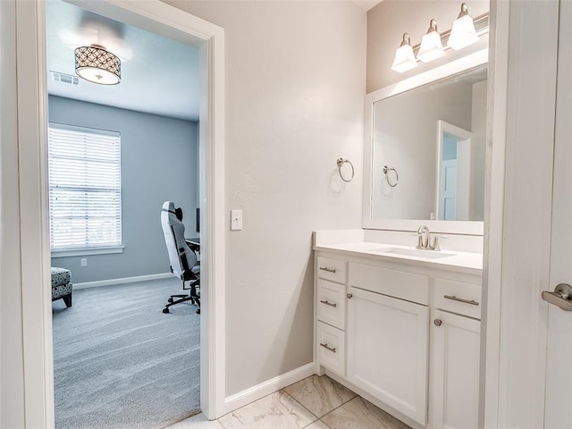 609 Newport Bridge Dr, Edmond, OK 73034 - bathroom featuring vanity and baseboards
