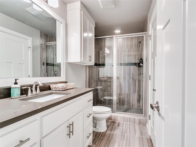 609 Newport Bridge Dr, Edmond, OK 73034 - bathroom featuring vanity, a shower stall, recessed lighting, and tile patterned floors