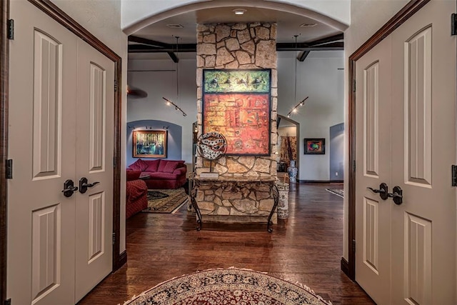 1701 Woodhill Rd, Edmond, OK 73025 - hall with arched walkways and wood finished floors