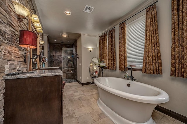 1701 Woodhill Rd, Edmond, OK 73025 - full bath with a stall shower, vanity, and a freestanding tub