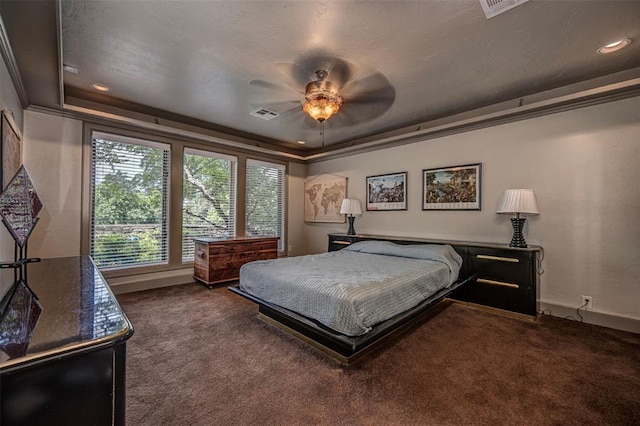 1701 Woodhill Rd, Edmond, OK 73025 - carpeted bedroom featuring recessed lighting, a raised ceiling, ceiling fan, and crown molding