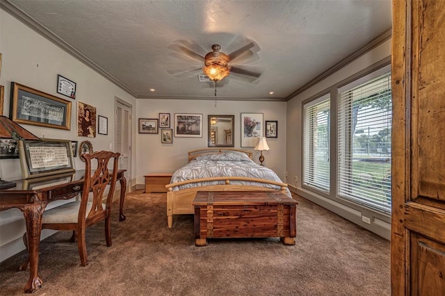 1701 Woodhill Rd, Edmond, OK 73025 - carpeted bedroom with ornamental molding and ceiling fan