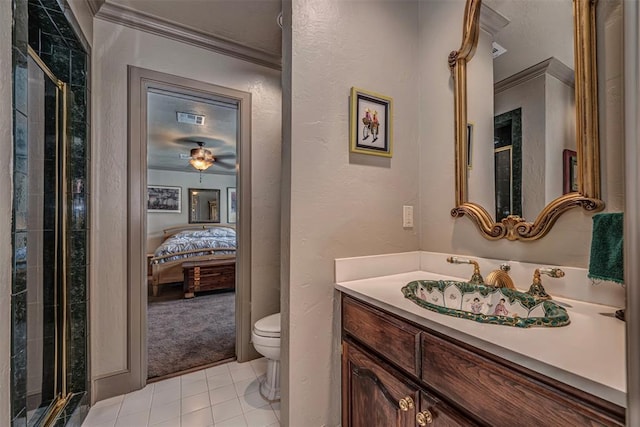 1701 Woodhill Rd, Edmond, OK 73025 - full bath with vanity, crown molding, a shower stall, connected bathroom, and tile patterned flooring