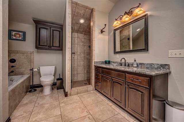 1701 Woodhill Rd, Edmond, OK 73025 - bathroom featuring a garden tub, vanity, tiled shower, and tile patterned flooring