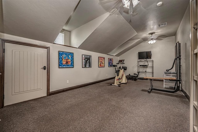 1701 Woodhill Rd, Edmond, OK 73025 - workout room featuring a ceiling fan, vaulted ceiling, and carpet