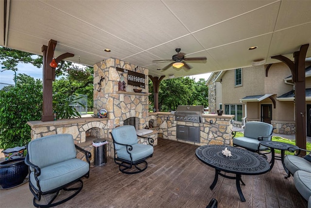 1701 Woodhill Rd, Edmond, OK 73025 - view of patio featuring grilling area, an outdoor stone fireplace, and a ceiling fan