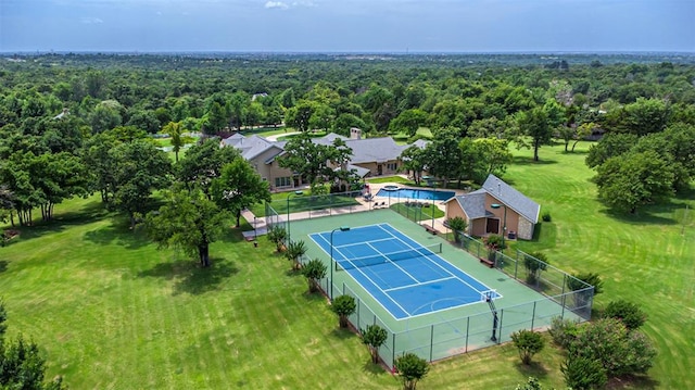 1701 Woodhill Rd, Edmond, OK 73025 - drone / aerial view of a heavily wooded area