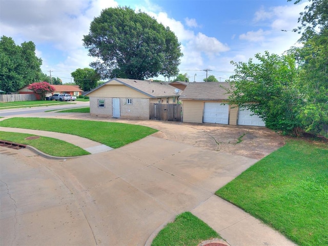 650 NW 5th St, Moore, OK 73160 - view of front of property featuring a garage and an outdoor structure