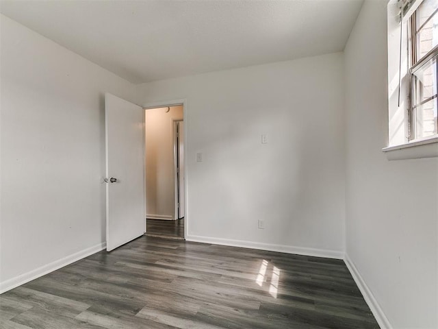 650 NW 5th St, Moore, OK 73160 - empty room with dark wood-style floors