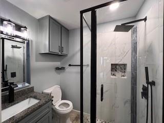 1727 NW 31st St, Oklahoma City, OK 73118 - full bath with a marble finish shower and vanity