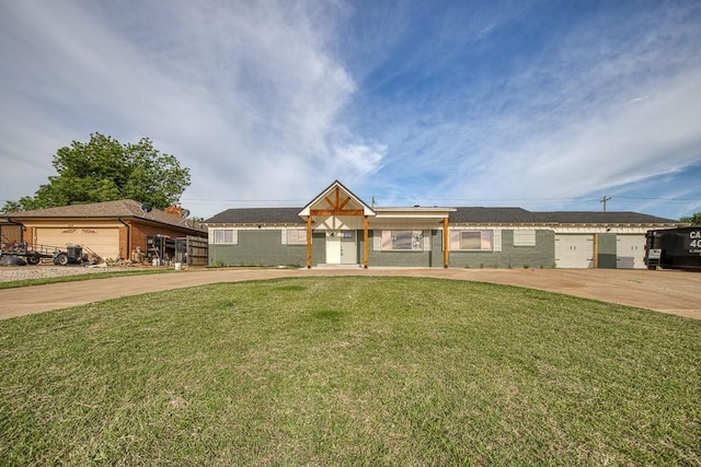 1212 S Main St, Kingfisher, OK 73750 - view of front of property featuring a front yard and brick siding