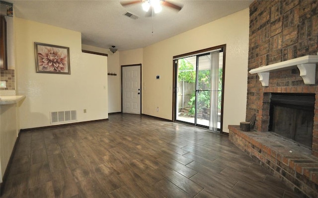 1333 SW 95th St, Oklahoma City, OK 73159 - unfurnished living room featuring a ceiling fan, wood finished floors, and a fireplace