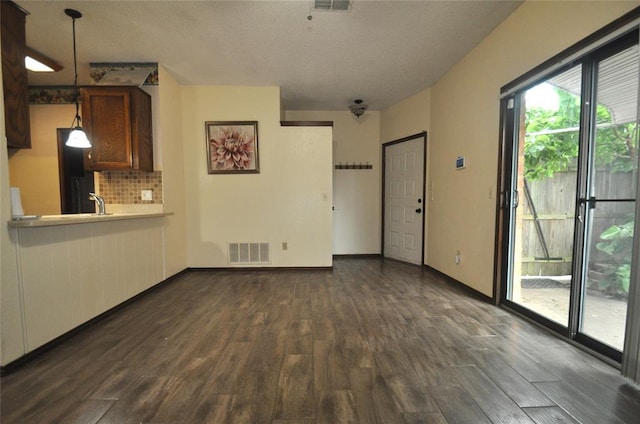 1333 SW 95th St, Oklahoma City, OK 73159 - unfurnished living room featuring dark wood finished floors