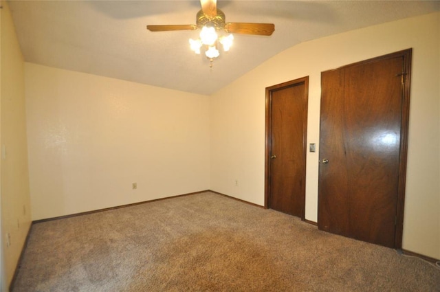 1333 SW 95th St, Oklahoma City, OK 73159 - unfurnished bedroom featuring carpet floors, vaulted ceiling, multiple closets, and ceiling fan