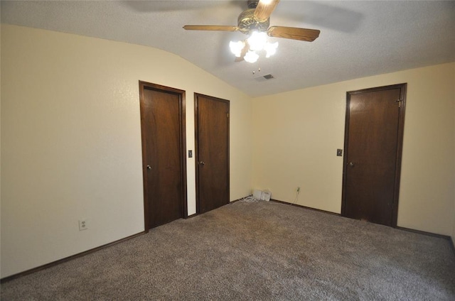 1333 SW 95th St, Oklahoma City, OK 73159 - unfurnished bedroom with two closets, vaulted ceiling, carpet flooring, and ceiling fan
