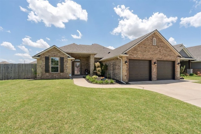 28 143rd St, Oklahoma City, OK 73170 - ranch-style house featuring a garage, concrete driveway, brick siding, and a shingled roof