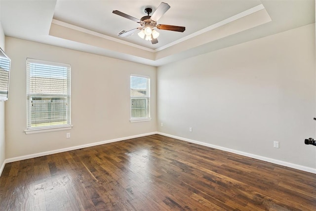 28 143rd St, Oklahoma City, OK 73170 - empty room with ornamental molding, a raised ceiling, wood finished floors, and a ceiling fan