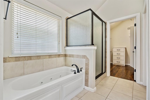 28 143rd St, Oklahoma City, OK 73170 - full bath with a stall shower, a jetted tub, and tile patterned floors