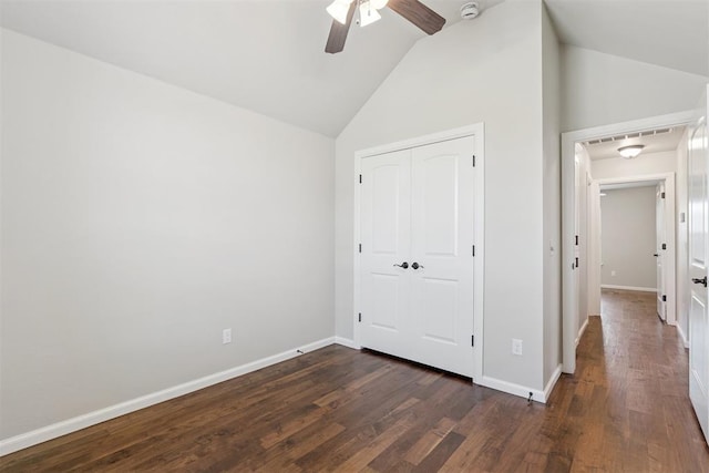 28 143rd St, Oklahoma City, OK 73170 - unfurnished bedroom featuring dark wood-style flooring, a closet, ceiling fan, and high vaulted ceiling
