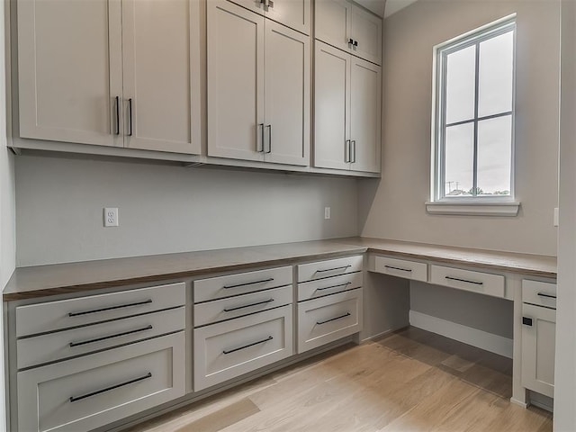 6104 NW 147th Ter, Oklahoma City, OK 73142 - unfurnished office with plenty of natural light and light wood finished floors