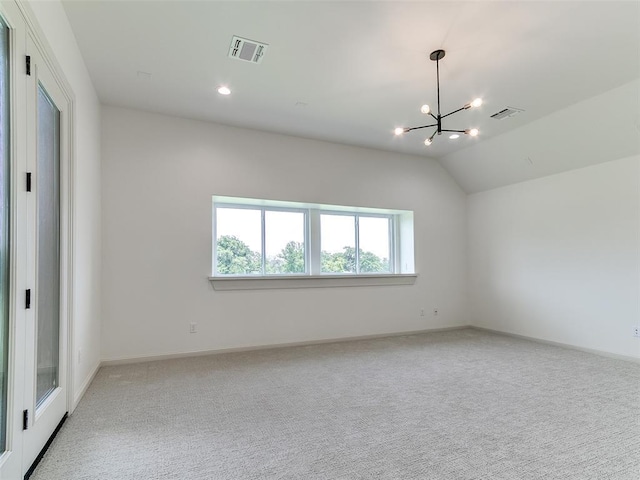 2261 Winter Creek Blvd, Blanchard, OK 73010 - unfurnished room with a chandelier, carpet, and vaulted ceiling