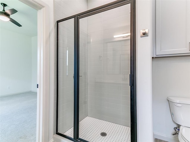 2261 Winter Creek Blvd, Blanchard, OK 73010 - bathroom featuring a shower stall and ceiling fan