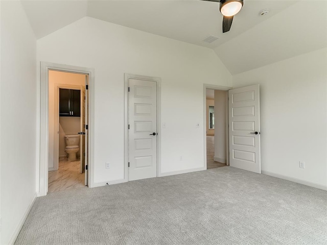 2261 Winter Creek Blvd, Blanchard, OK 73010 - unfurnished bedroom featuring lofted ceiling, carpet, connected bathroom, and a ceiling fan