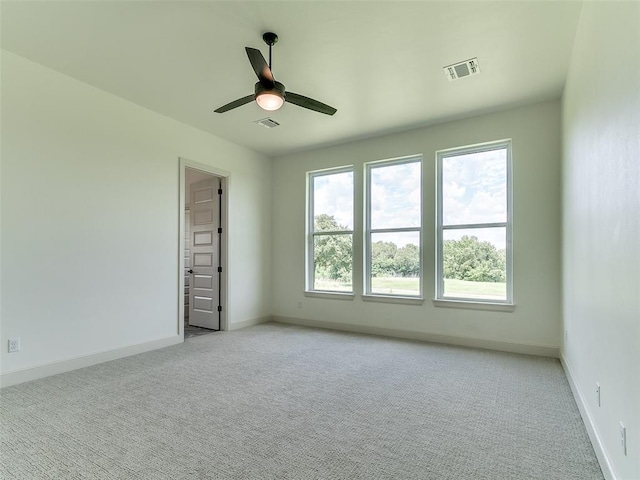 2261 Winter Creek Blvd, Blanchard, OK 73010 - empty room featuring light colored carpet and ceiling fan