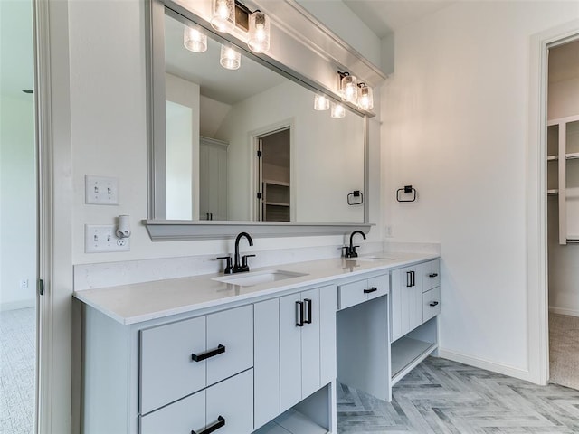 2261 Winter Creek Blvd, Blanchard, OK 73010 - bathroom featuring double vanity and a walk in closet