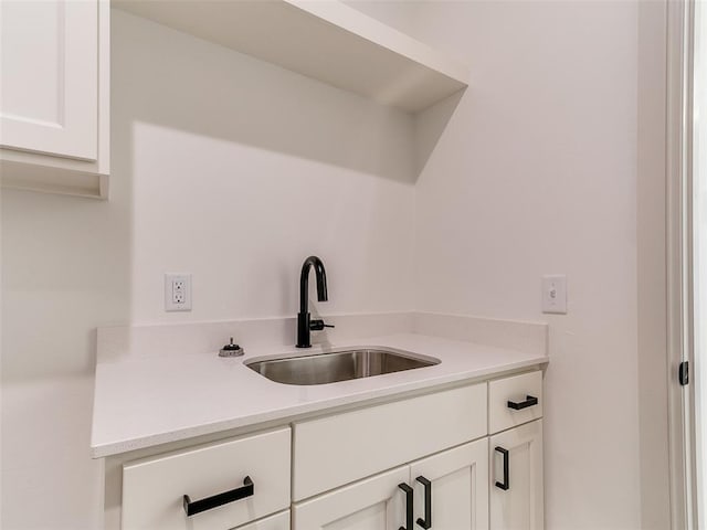 2261 Winter Creek Blvd, Blanchard, OK 73010 - kitchen featuring light countertops and white cabinetry
