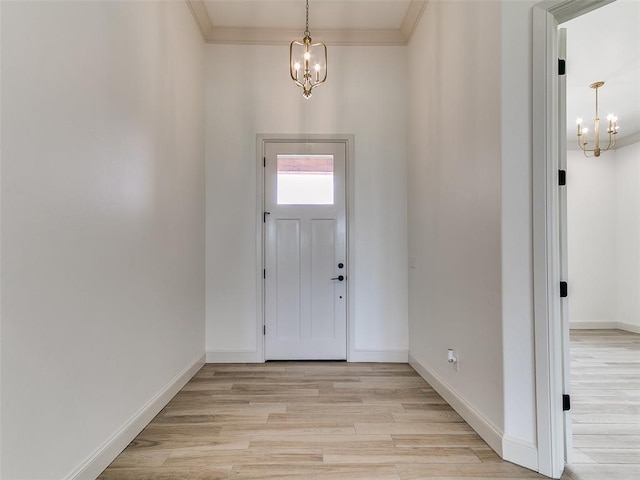 2263 Winter Creek Blvd, Blanchard, OK 73010 - entrance foyer featuring a chandelier, light wood-style flooring, and crown molding